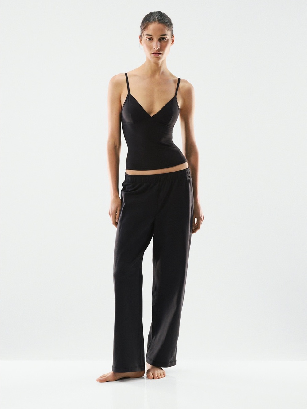Aritzia TNA Golden V-neck Cami Activewear Tank Top in Black